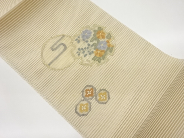 絽綴れ雪輪に草花模様織出し名古屋帯